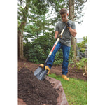 Wood handle transfer shovel being used.