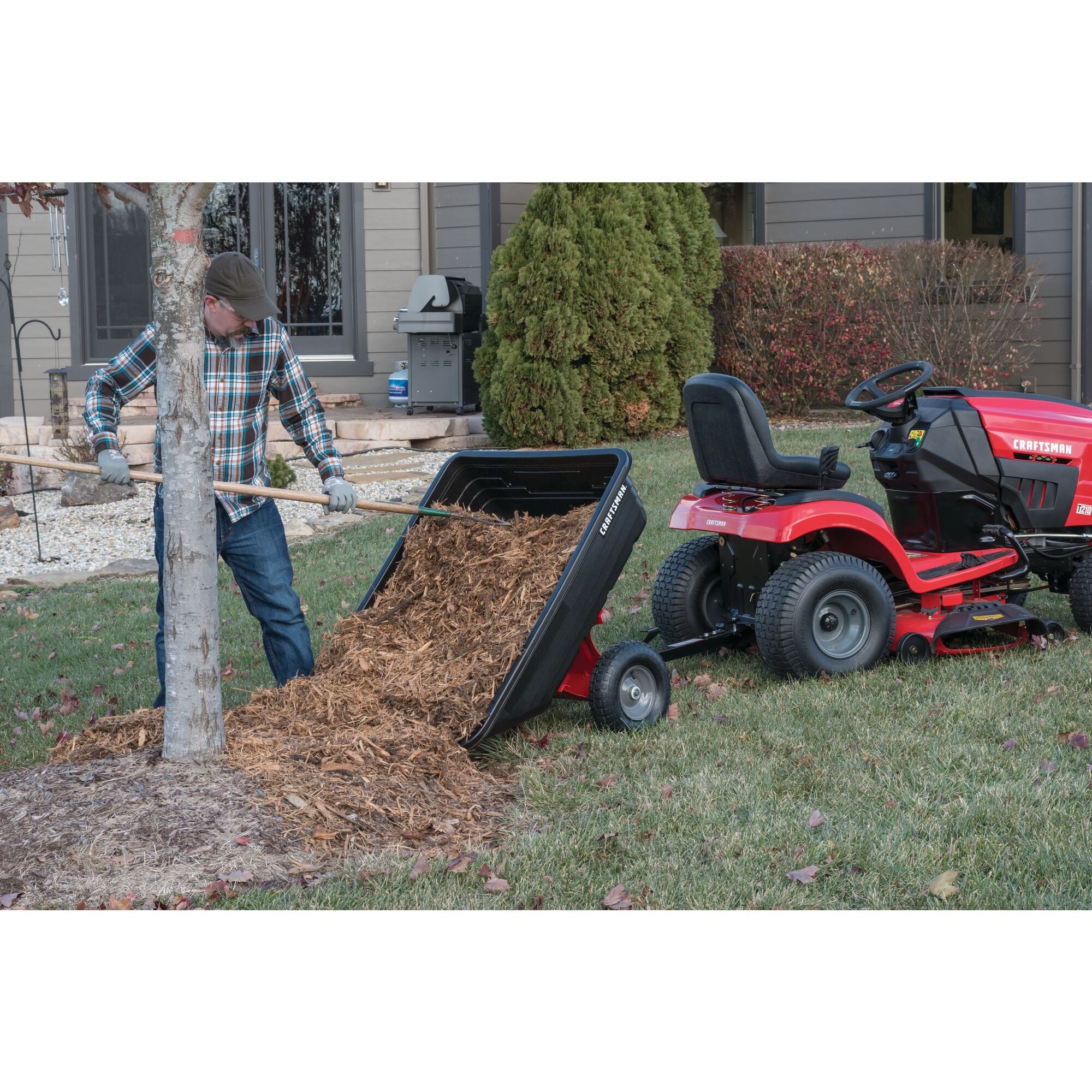 10 cubic foot poly cart being unloaded by person.