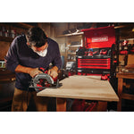 15 amp seven and a quarter inch circular saw being used by a person.