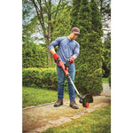20 volt weedwacker 13 inch cordless string trimmer and edger with automatic feed kit being used by a person outdoors.