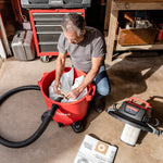 Person installing a CRAFTSMAN General Purpose Wet/Dry Shop Vacuum Dust Collection Bag in a  vac
