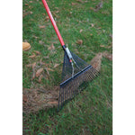 24 inch tine fiberglass handle lawn rake being used.
