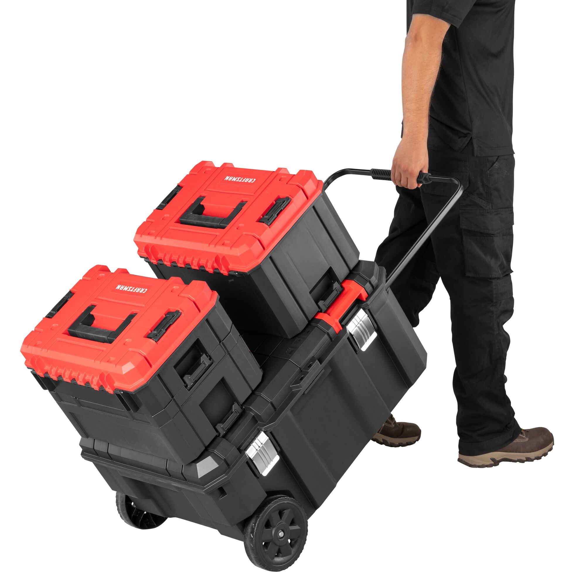 CRAFTSMAN VERSASTACK 30 Gallon Chest with additional VERSASTACK products attached being pulled by person
