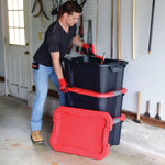 20 Gallon latching tote being used by a person to stack multiple bins.