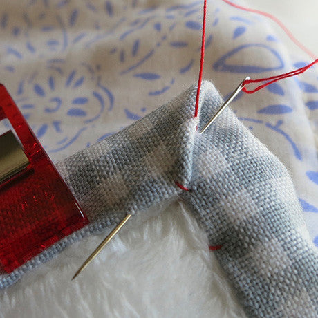 Attach the binding and finish the corners – Sewing Bird