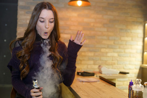 A lady enjoying her vaping flavor