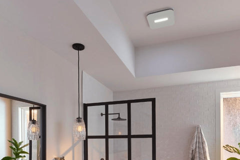 High-end, smart bathroom fan installed with light and sensors