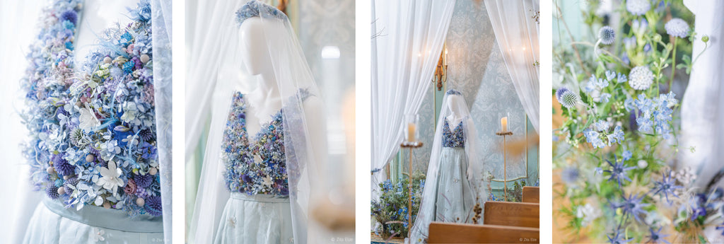 details of wedding dress with blue flowers embroidery 