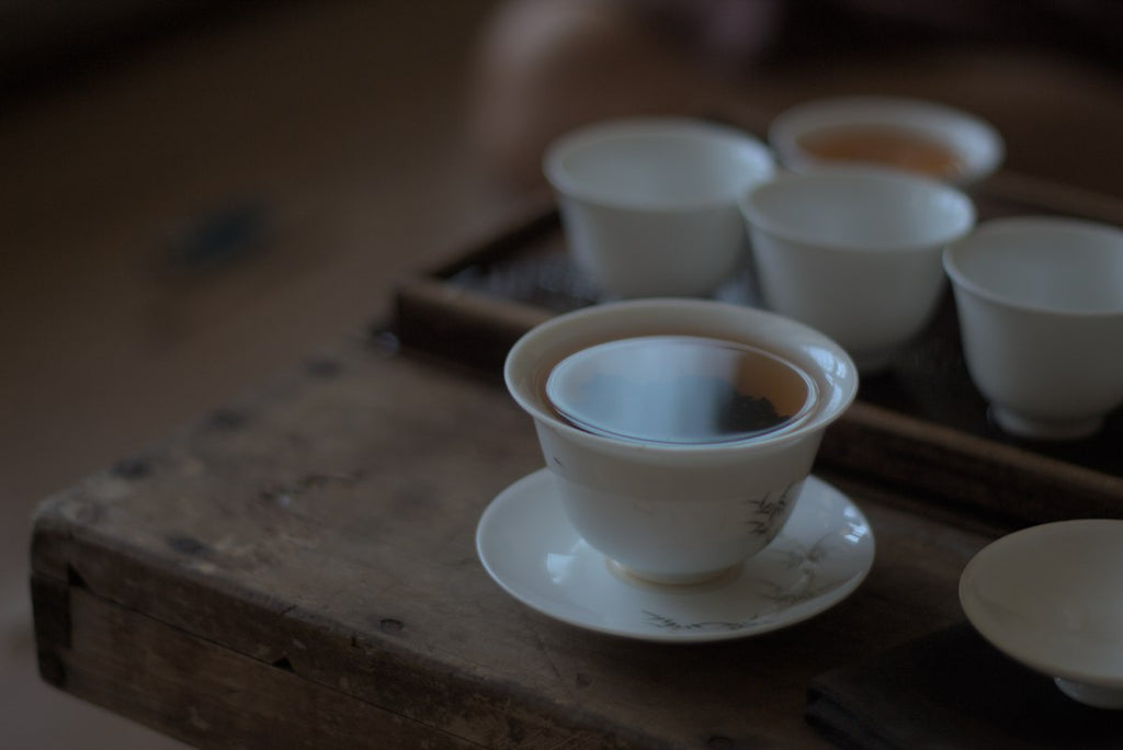 wild oolong tea in porcelain tea ware