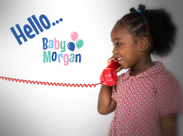 Child talking on telephone.