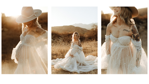 maternity photoshoot in a field with a sheer ivory dress covered in pearls and a wide brim hat