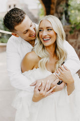 Engagement dress rental white tulle dress couple poses