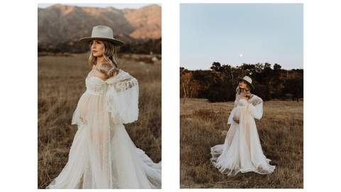 maternity photoshoot in a field with a sheer ivory dress covered in pearls and a wide brim hat