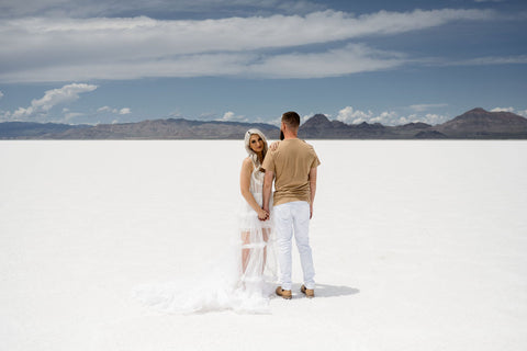 couple at the salt flats, sunny day, white lace dress