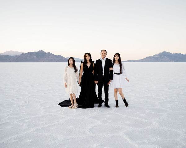 family photos at the salt flats in dresses and suit