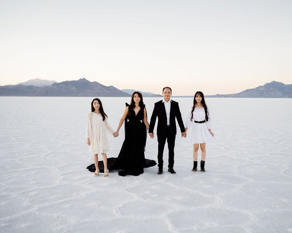 family photos at the salt flats in dresses and suit