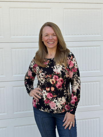 image of a person wearing a floral top