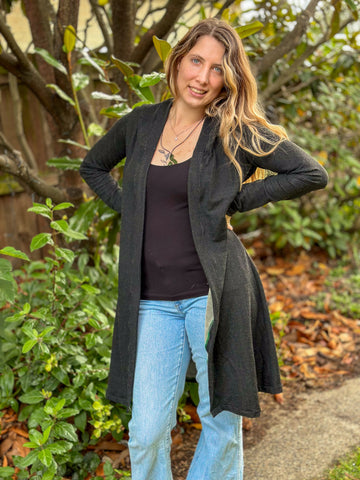 image of a person wearing a cardigan