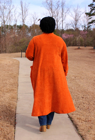 image of a person wearing a cardigan