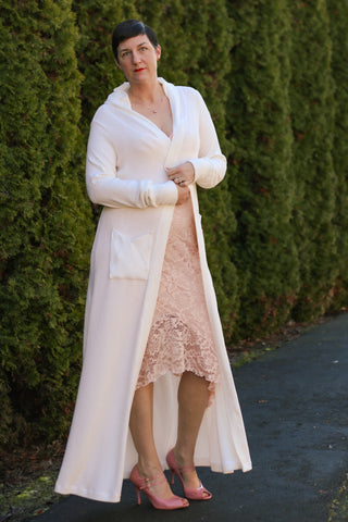 image of woman wearing a dress and cardigan