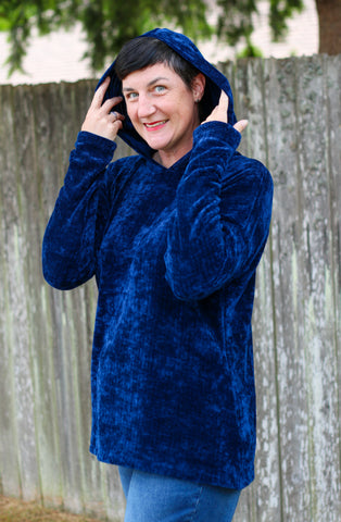 image of woman wearing blue hoodie