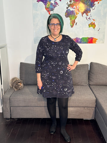image of person wearing a black dress