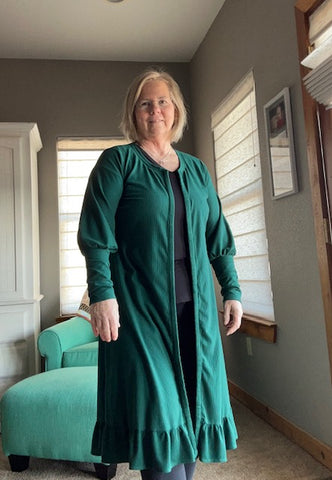 image of a person wearing a green dress