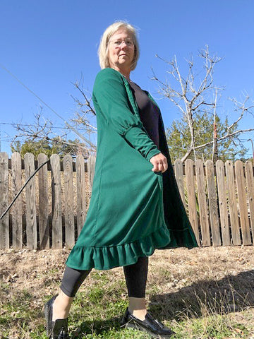 image of a person wearing a green dress