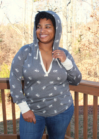 image of a person wearing a gray hoodie