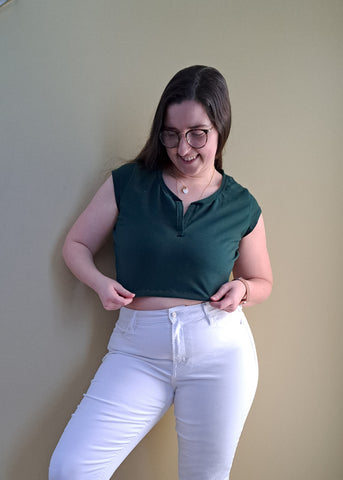 image of person wearing a green crop top