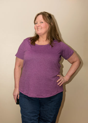 image of a person wearing a purple top
