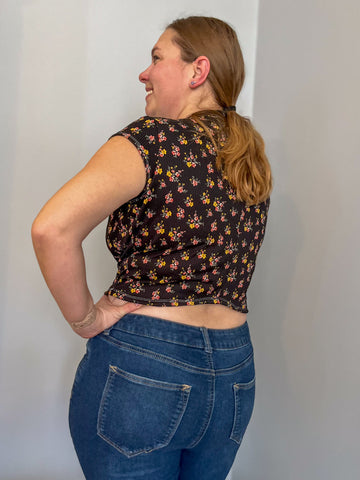 image of a person wearing a floral crop