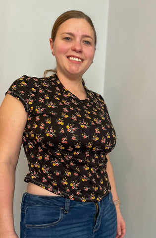 image of a person wearing a floral crop
