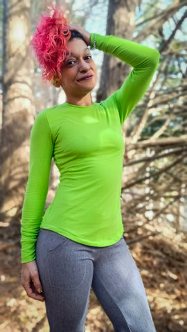 image of a person wearing a bright green top