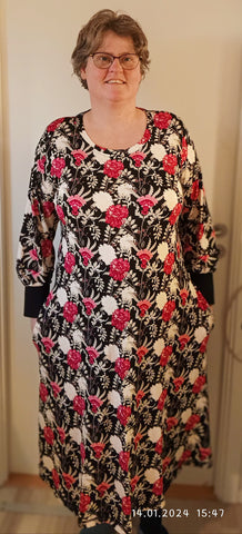 image of a person wearing a floral print dress