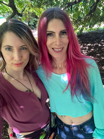 image of two people selfie wearing crop tops