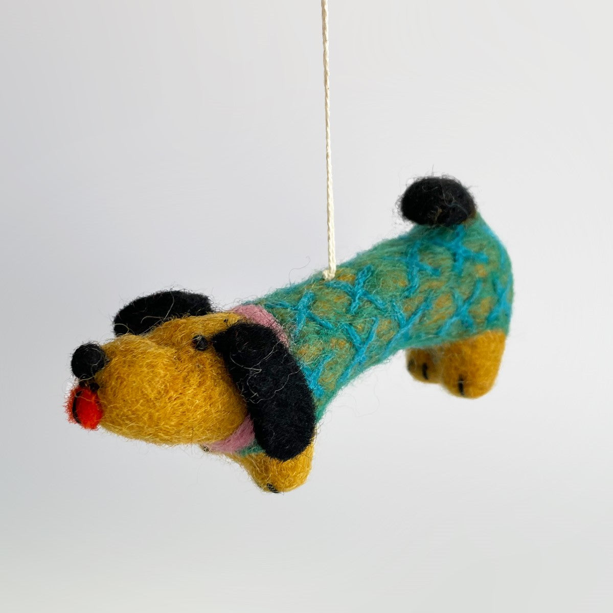 wool felt weenie dog wall hanging in a 3 inch embroidery hoop 