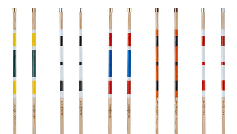 A bunch of different alignment sticks in different colors, against a white background