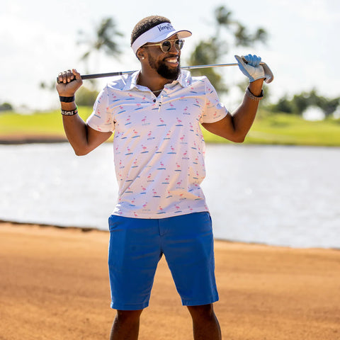 Golfer standing in a bunker wearing cool golf clothes