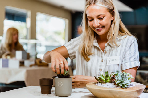 planting succulents in our candle glass