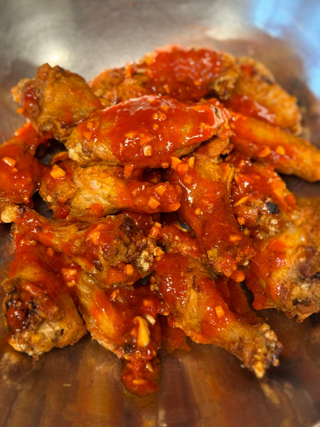 Buffalo Wings drizzled with Mustaphas Harissa