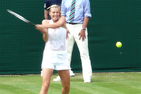 Maria Sharapova in action against Stéphanie Foretz in the first round of the 2008 Wimbledon Championships