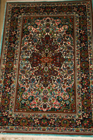 real silk knotted rug