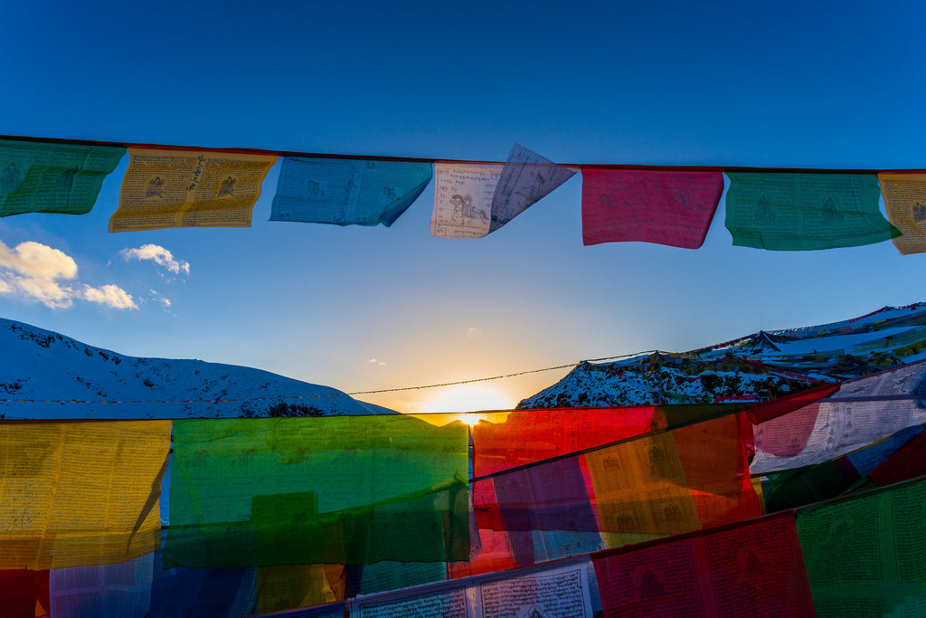 Colourful flags across mountain scenery in Tibet