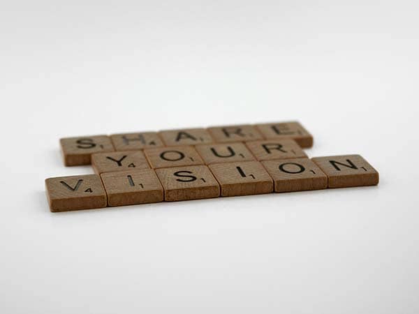 Share Your Vision in wood blocks - photo by Brett Jordan on Unsplash