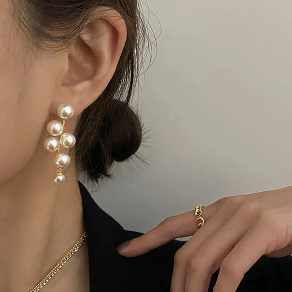 niebla tóxica oportunidad mago Aretes Colgantes Bohemios de Perlas en Oro – Bellas Joyas