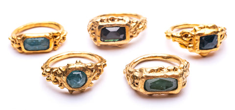 Bea Jareno Jewellery group of plethora rings cut out photo recycled gold vermeil with faceted freeform blue and green tourmaline gemstones