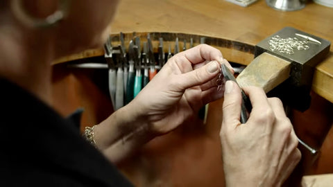 Bea Jareno Jewellery sitting at her bench in her West London Studio