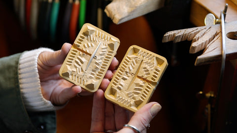 Bea Jareno Jewellery sitting at the bench with one of her Afiok quill clasp moldes