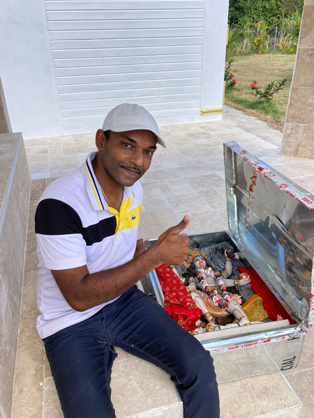 PICTURE OF HAPPY CUSTOMER IN GUADELOUPE AFTER THEY RECEIVE KALI MAA STATUE SHIPMENT FROM KARIGAROFFICIAL